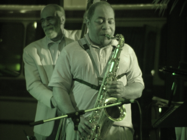 Herman Riley, with John Heard on the bass.